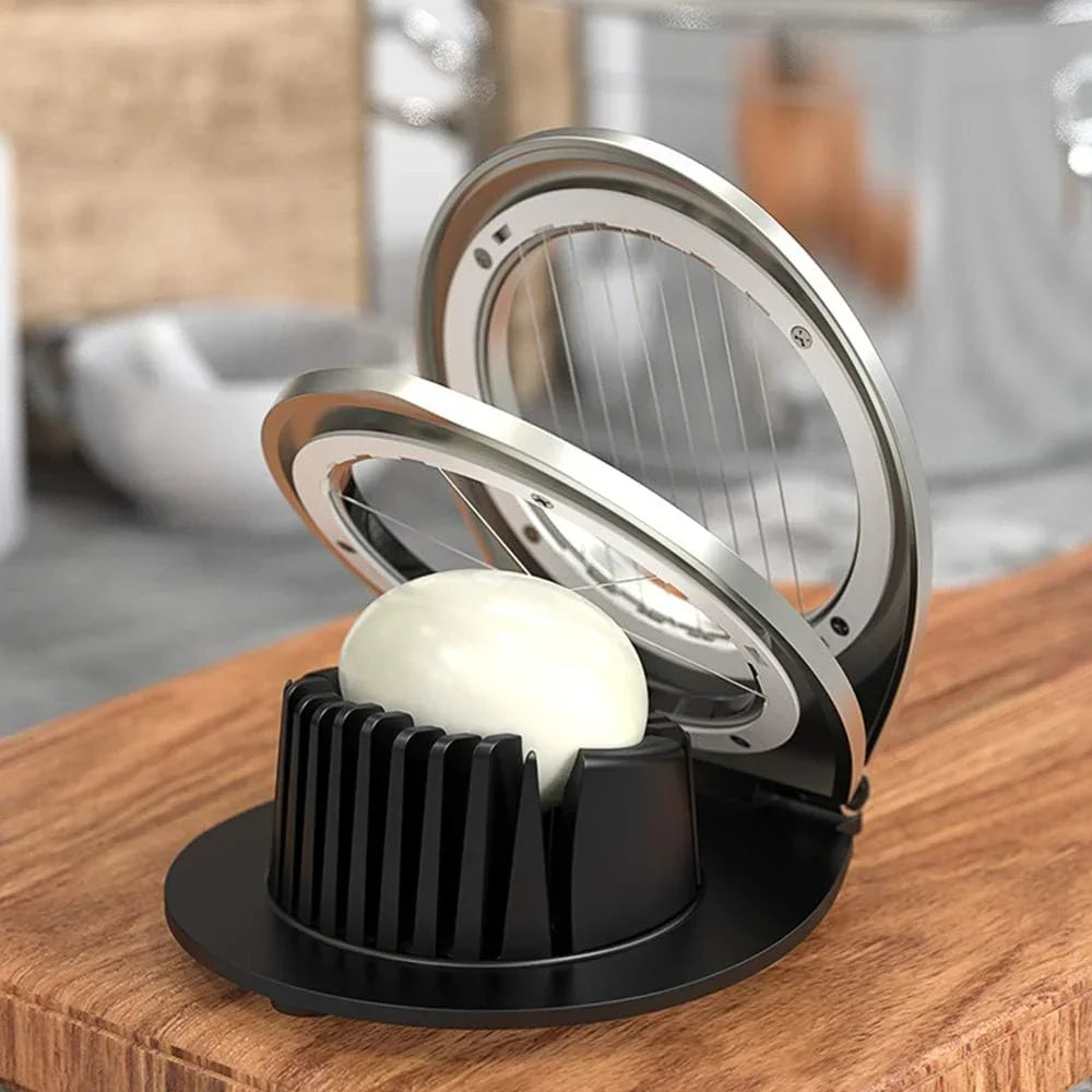 Stainless steel egg divider - slices, wedges & quarters in one
