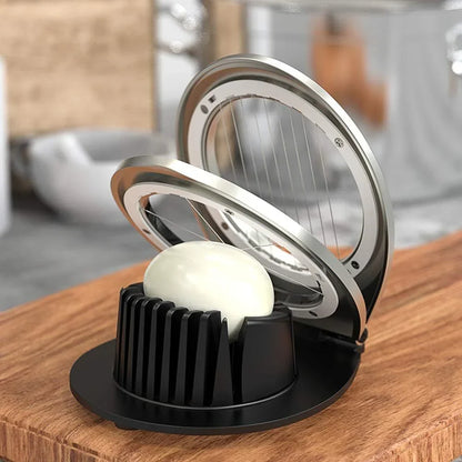 Stainless steel egg divider - slices, wedges & quarters in one